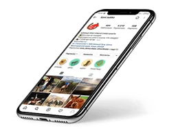 Смартфон с профилем компании в социальной сети